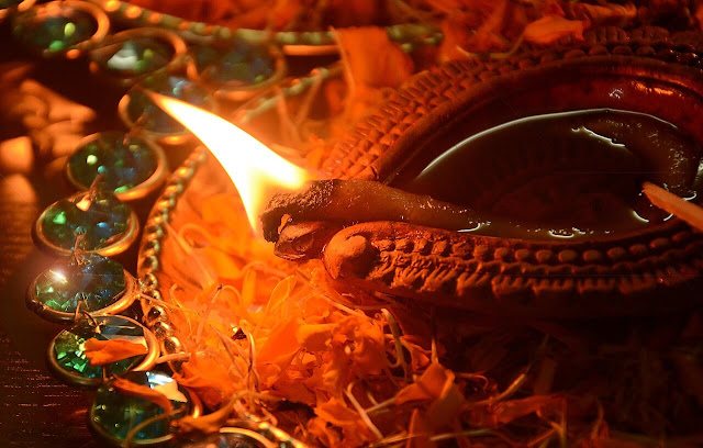 a-lighted-clay-lamp-on-Lakshmi-pujan
