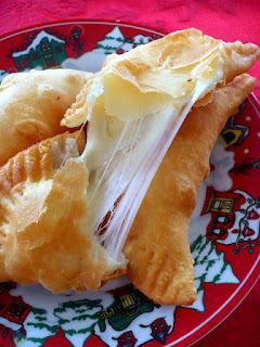 http://www.clockworklemon.com/2012/01/cheese-empanadas-improved-recipe.html