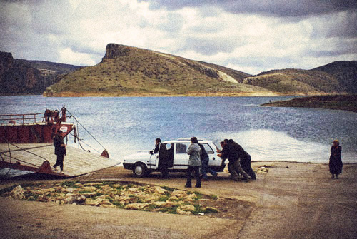 dirty blog - found photos : photo of men pushing car near lake 