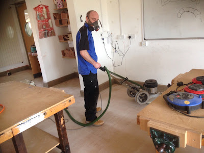 Ben wearing his safety masks during the sanding process