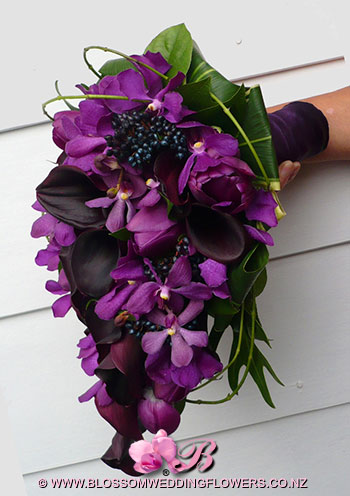 Purple bridal bouquets purple wedding bouquets woodsy wedding centerpieces