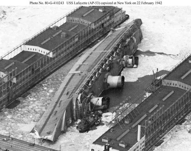 SS Normandie after it capsized on 9 February 1942, worldwartwo.filminspector.com