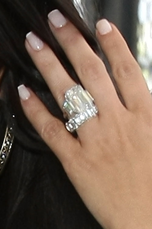 The wedding band is shown with Kardashian's 205carat engagement ring