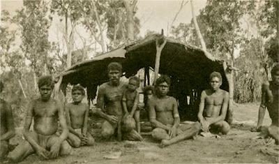 https://commons.wikimedia.org/wiki/File:Aboriginal_boys_and_men_in_front_of_a_bush_shelter_-_NTL_PH0731-0022.jpg