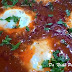 Shakshuka - ovos com molho de tomate temperado