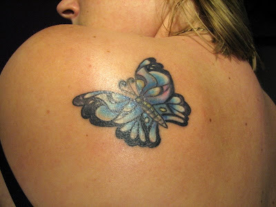 butterfly tattoos on feet. utterfly tattoo on upper back