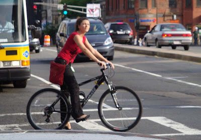 red leather bag on a bike