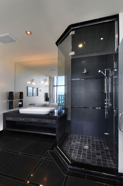 Picture of black floor and black furniture in the modern penthouse bathroom