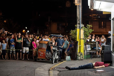 Extrajudicial killing of alleged drug trafficker, Philippines.
