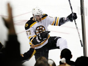 Benoit Pouliot celebrates his game winning goal in the shootout