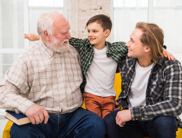 A young child and older adult share a moment of connection, reflecting the importance of empathy across life stages.