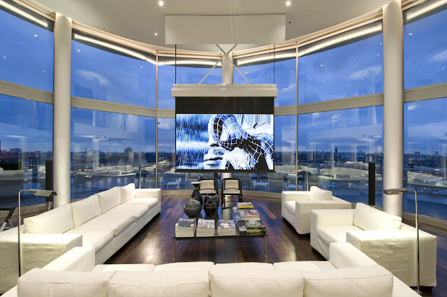 Picture of the living room interiors of the riverside penthouse with incredible city views 