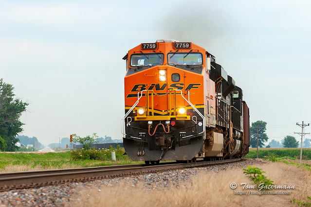 BNSF 7759 and a NS locomotive lead an iron ore train south between Elsberry, MO., and Annada, MO