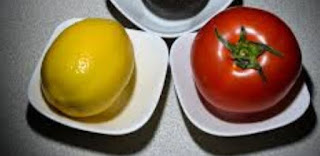 acne remedies: Tomato or lemon