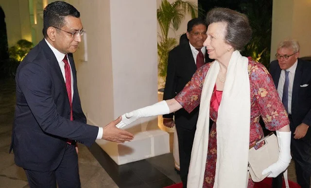 Princess Anne wore a floral print dress, pearl earrings and perarls necklace. United Kingdom and Sri Lanka