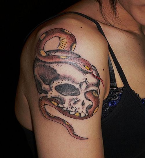 skull tattoo on back. The first of my snake tattoos