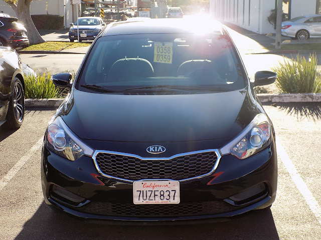 2015 Kia Forte after auto body repairs at Almost Everything Auto Body.