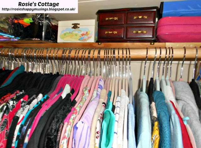 Closet shelf BEHIND the clothes rail - Fabulous use of space