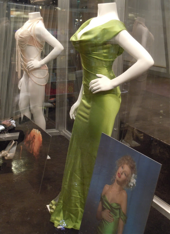christina aguilera burlesque green dress hair. Cher and Christina Aguilera in