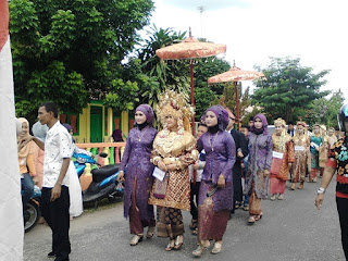 TRADISI MIDANG DI KAYUAGUNG