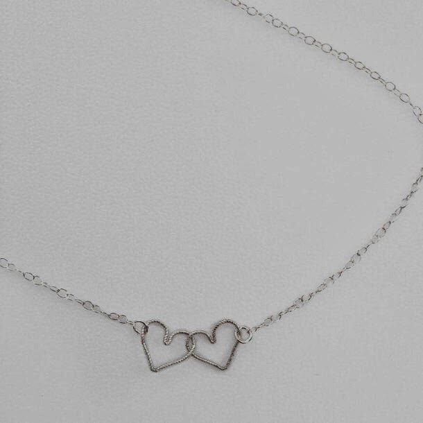 http://www.shopstyle.com/browse?pid=uid6496-22988364-91&fts=double+heart+necklace