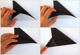 fold origami paper to make a sideways star-trek sign