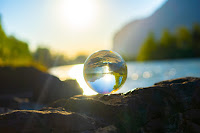 Glass Globe - Photo by Alin Andersen on Unsplash