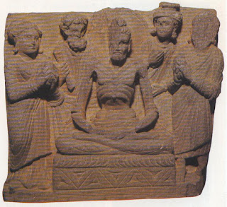 Buddha, having attempted for six years to attain enlightenment through the ascetic's route of starvation, realises that such means must be rejected just as firmly as the philosophical obscurities of the sages and the ritual of the priests, and accepts food from the daughters of Sena. Probably from Jamal Garhi, Yusufzai. British Museum, London. 