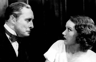 Lionel Atwill staring down a frightened Fay Wray in The Vampire Bat (1933)