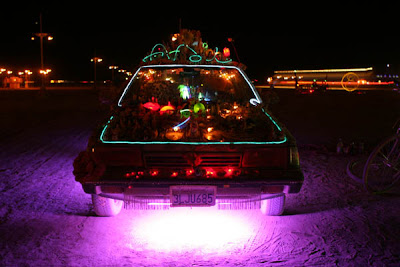 The Vehicle of Enlightenment art car at night by Susan Jette
