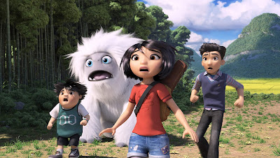 Chloe Bennet, Albert Tsai, and Tenzing Norgay Trainor help Everest the yeti get home in a movie still for the 2019 animated film "Abominable"