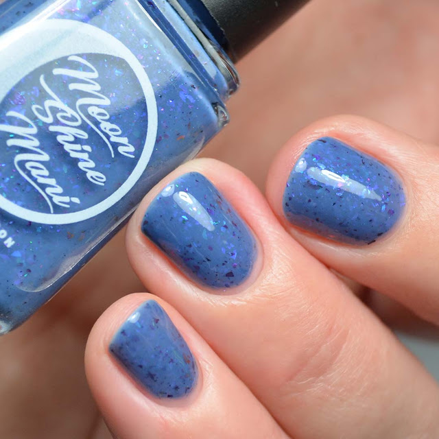 blue nail polish with flakies