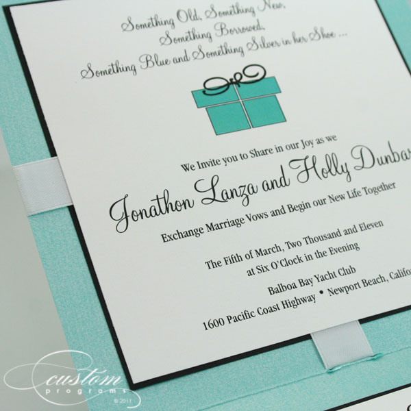 This Tiffany Blue invitation is a fun cute way to share your wedding colors