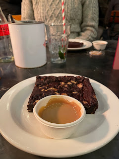 A chocolate cookie with caramel sauce.