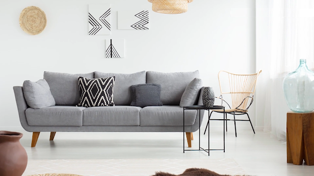 Sofa in the interior in the Scandinavian style