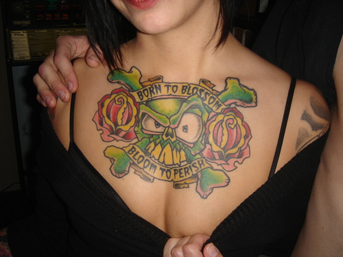 girl tattoos on hip. skull tattoos chest