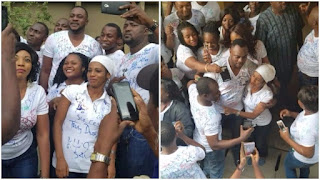 Photos: Odunlade Adekola graduates from UNILAG, joins colleagues to sign out on T-shirts