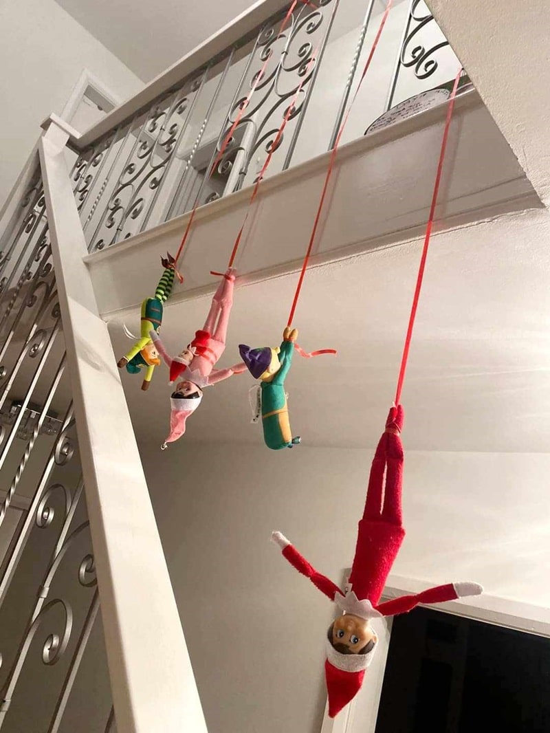 elves bungee jumping from stairs.