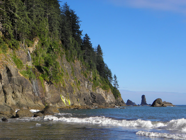 Tiny Strawberry falls on left, Rocky point on right, waves in foreground