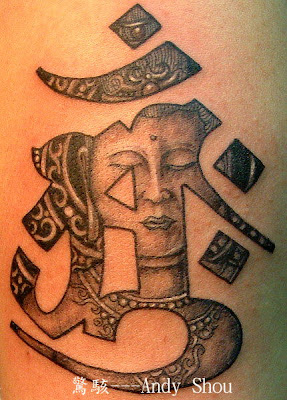 a Sanskrit character and a buddha face hiding behind it