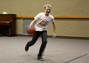 Jaxon dribbling past his dad trying to get a .