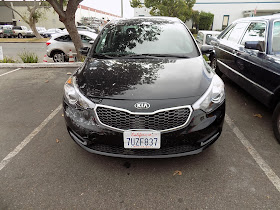 2015 Kia Forte before auto body repairs at Almost Everything Auto Body.