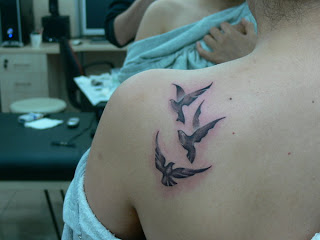 Dove Tattoos on back