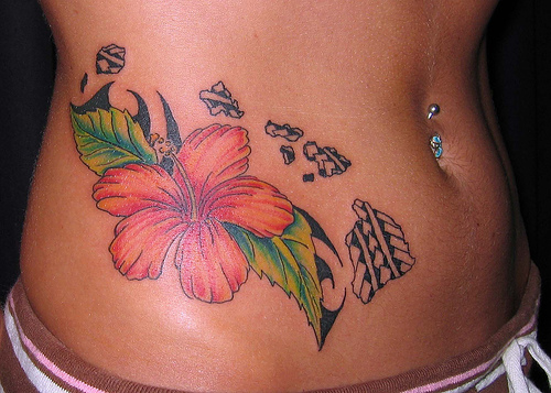 Flower Tattoo on Girl's Rib Flower Tattoo on Girl's Stomach