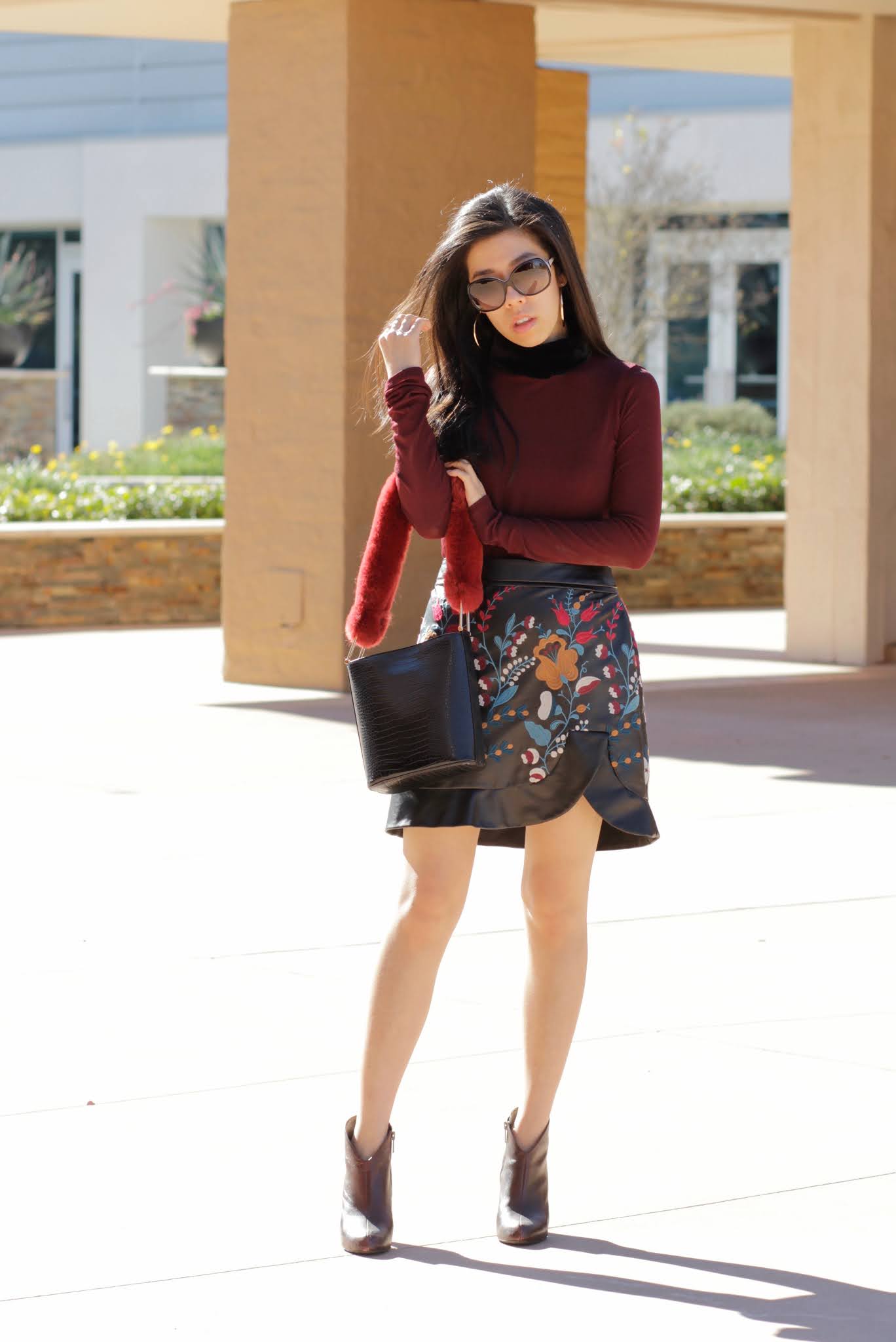 Adrienne Nguyen_Topshop Faux Fur Handle Leather Bag with Faux Fur Outfit and Leather Skirt and Booties_What to Wear to College