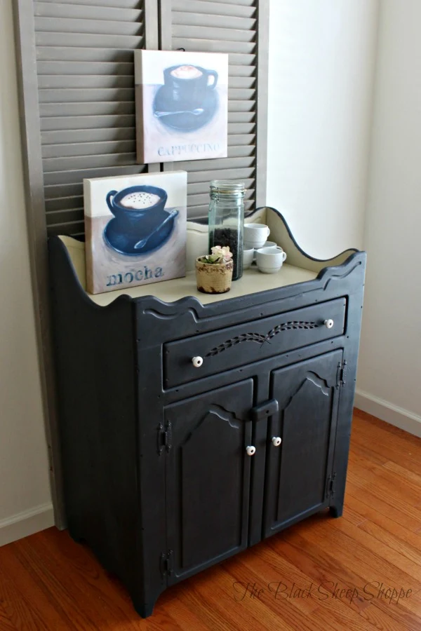 A dry sink cabinet allows for storage on the top, the drawer, as well as the interior shelves.