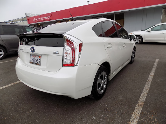 Prius rear bumper and tailgate damage after repairs at Almost Everything Auto Body.