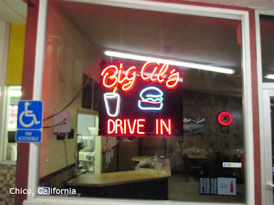 Neon sign in the dining room window of Big Al's Restaurant in Chico, CA