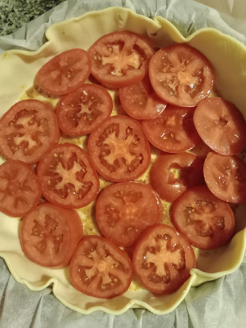 Homemade tomato tart ready for the oven. Photo by Loire Valley Time Travel.