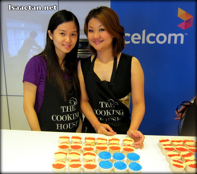 Janice and Wendy posing before continuing on with their cupcake decorations